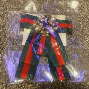 Elegant Striped Ribbon Brooch with Pearl Accents